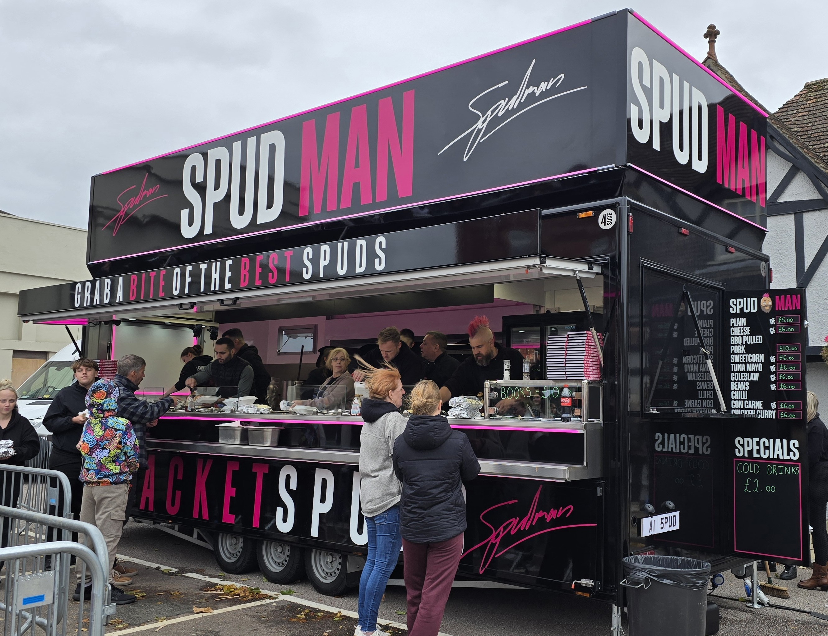 Spud Man jacket potato street food van with queues in the UK
